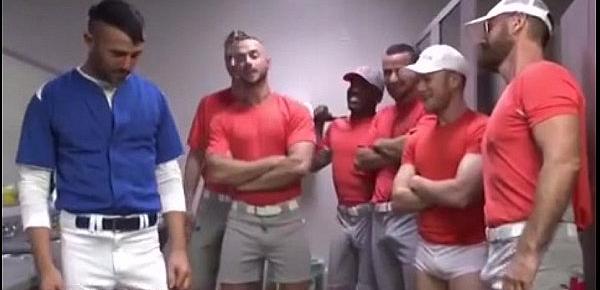  Muscular jock is bound and fucked by a baseball team